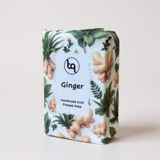 Handmade cold pressed ginger soap bar with botanical design on packaging