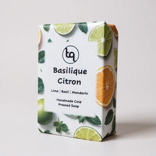 Soap bar with Basilique Citron packaging featuring lime, basil, and mandarin design on a light background.