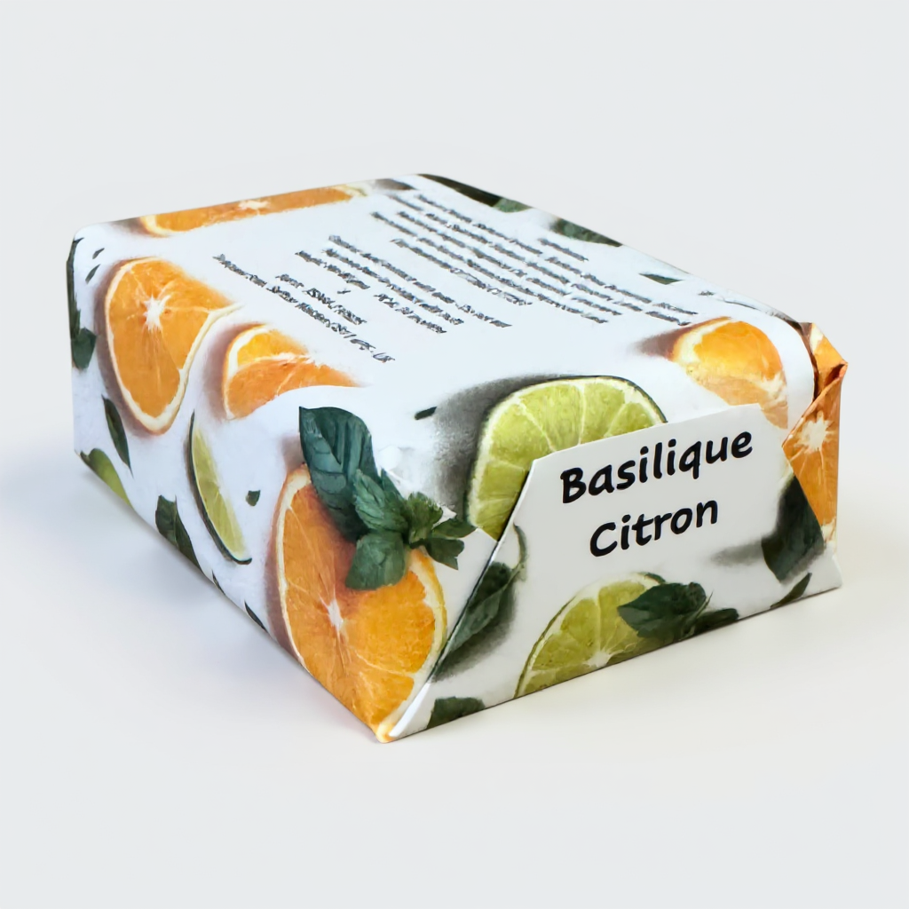 Soap bar with citrus fruit design and 'Basilique Citron' text on a white background