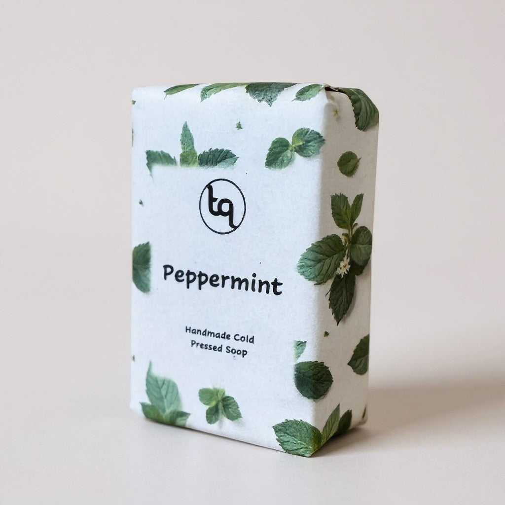 Truequest Peppermint soap bar with leaf pattern on packaging against a light background