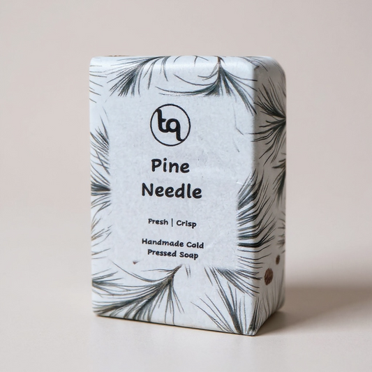 Handmade cold pressed soap with pine needle scent on a neutral background