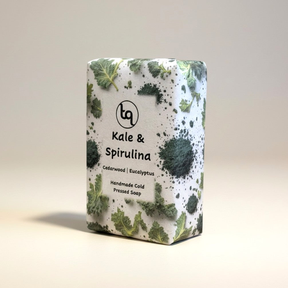 The main product photograph of an unwrapped Truequest kale and spirulina cold-pressed soap bar