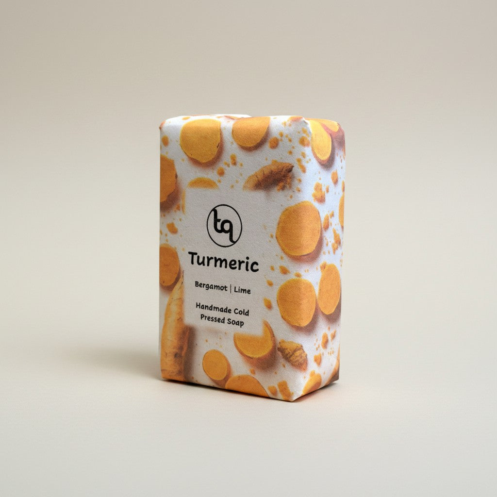 The main product photograph of an unwrapped Truequest turmeric cold-pressed soap bar
