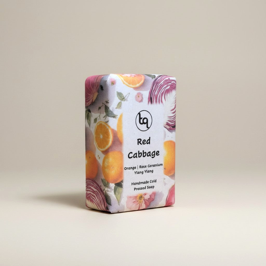 A front-facing main product shot of a single rectangular Truequest red cabbage cold-pressed soap bar.