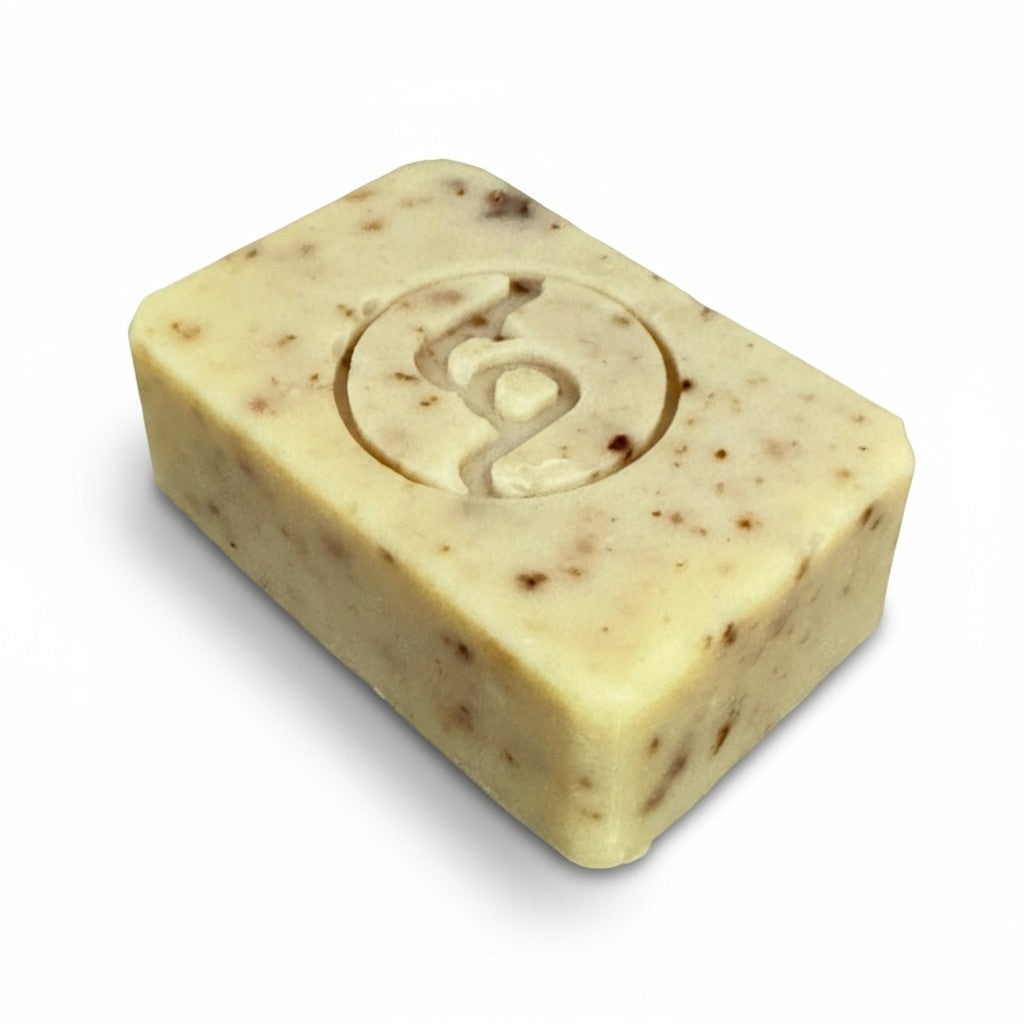 A front view of an unwrapped, naked Truequest red cabbage cold-pressed soap bar, highlighting its unique natural colour and rustic handmade texture