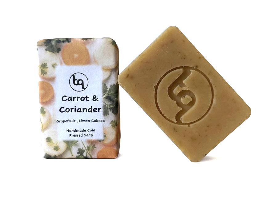 Carrot & Coriander soap bar with packaging on a white background