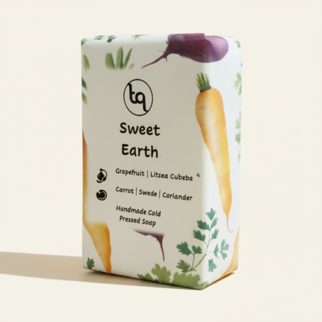 Truequest Sweet Earth Soap packaging with carrot and corinader  illustration on a beige background