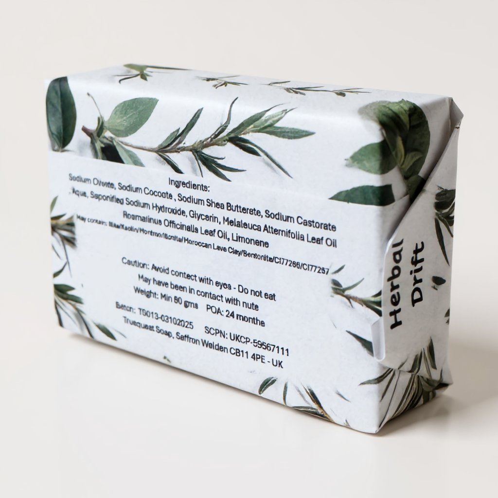 Truequest Herbal Drift cold pressed soap wrapped in botanical paper showing the full ingredient list and product details on the back'