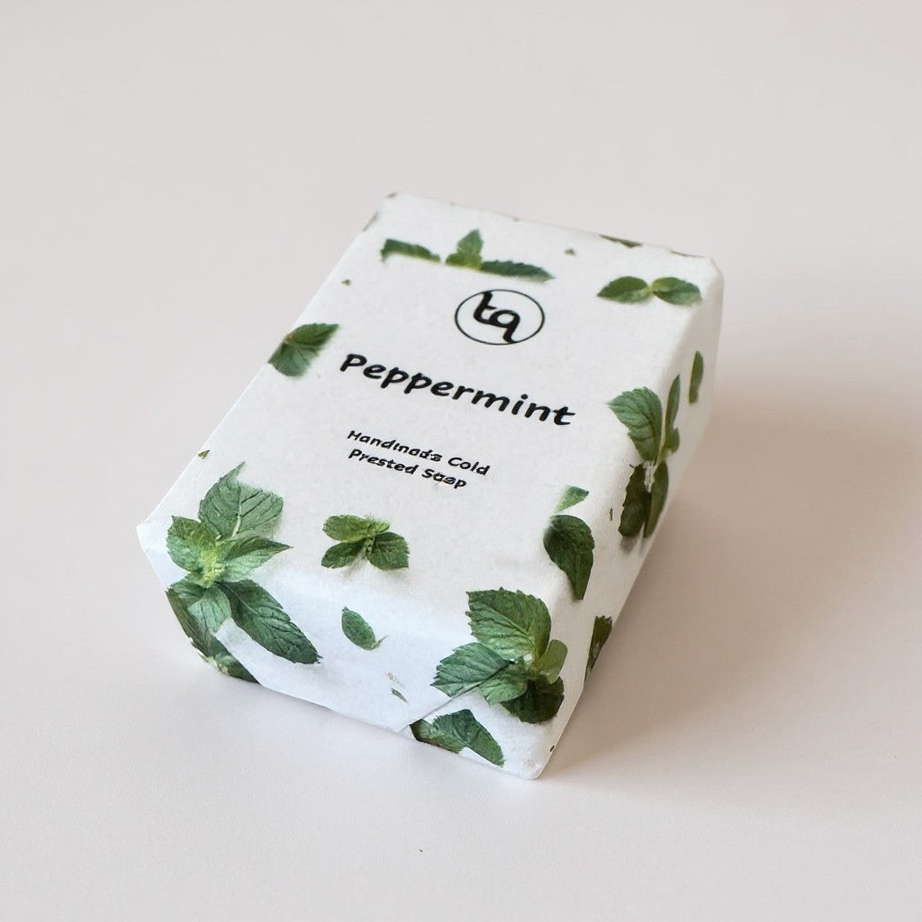 Truequest Peppermint handmade cold-pressed soap bar with mint leaf pattern and invigorating scent.