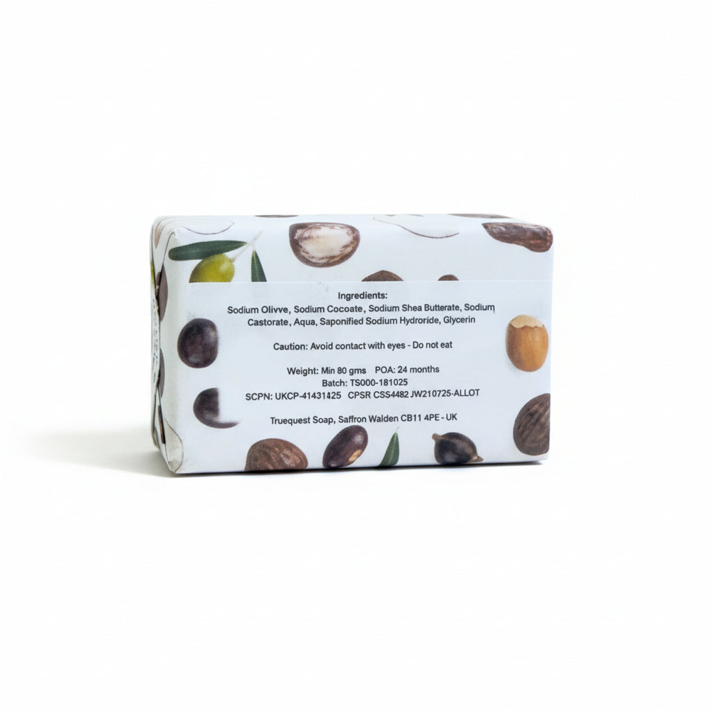Bar of unfragranced and uncoloured Truequest soap with ingredients label on a white background