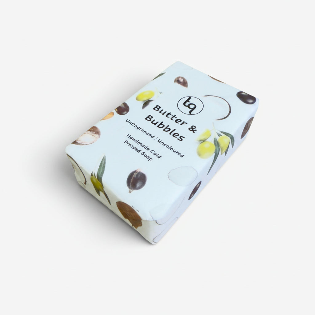 Truequest soap branded packaging with 'Butter & Bubbles' on a white background