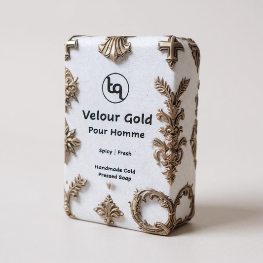Bar of Velour Gold soap with decorative packaging and Truequest branding on a light background